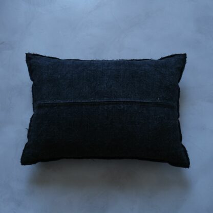 Antique hemp cusg=hion cover dyed in indigo and grey cedar